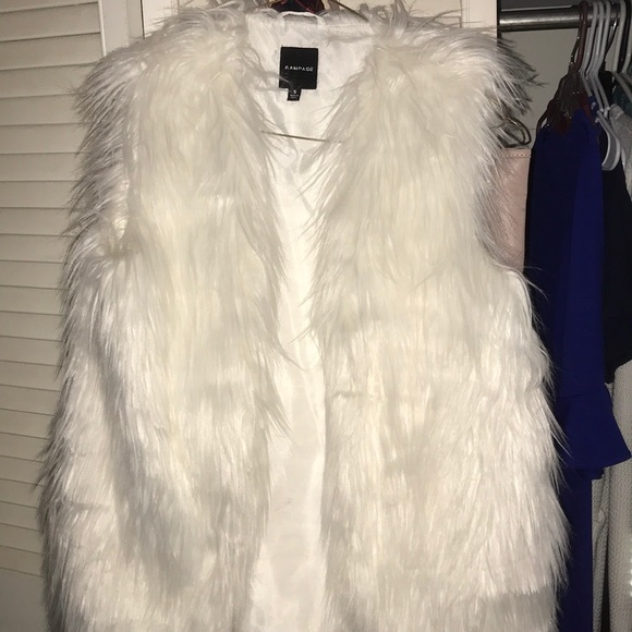 white fluffy vest
